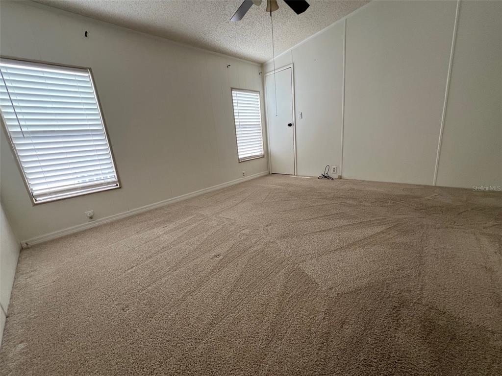 1001 Starkey Road, Unit 177 Largo, FL 33771 - Photo 35 of 44 a view of an empty room with a window