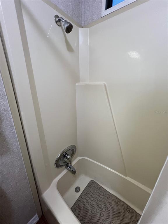 1001 Starkey Road, Unit 177 Largo, FL 33771 - Photo 37 of 44 a bathroom with a sink and shower