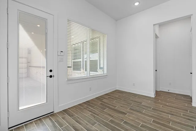 a bathroom with a bathtub and a sink