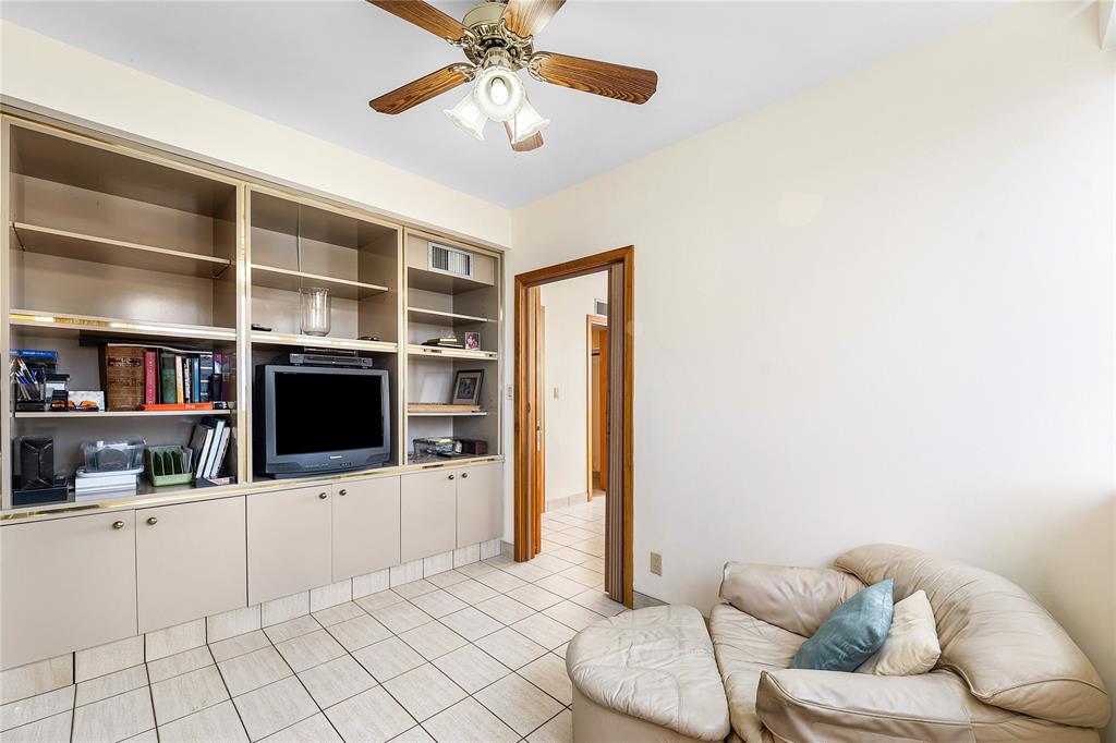 1900 South Ocean Drive, Unit 812 Fort Lauderdale, FL 33316 - Photo 31 of 65 a living room with furniture and a flat screen tv