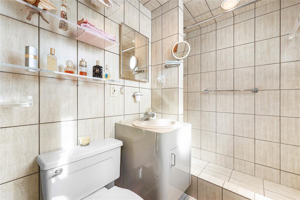 1900 South Ocean Drive, Unit 812 Fort Lauderdale, FL 33316 - Photo 33 of 65 a bathroom with a sink toilet and shower