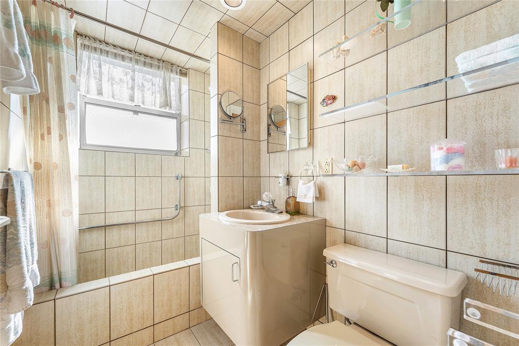 1900 South Ocean Drive, Unit 812 Fort Lauderdale, FL 33316 - Photo 37 of 65 a bathroom with a sink toilet and shower