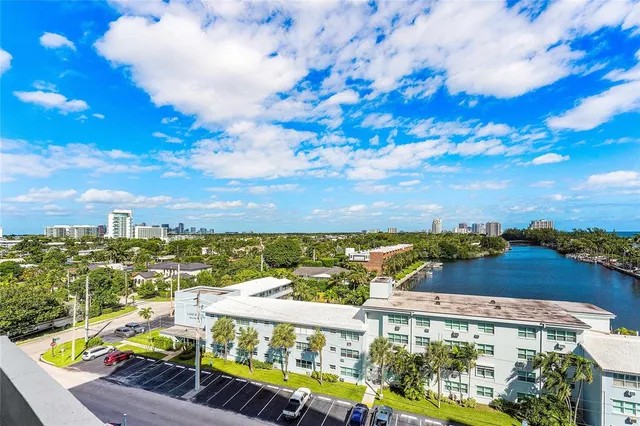 a view of a chairs and table in a backyard