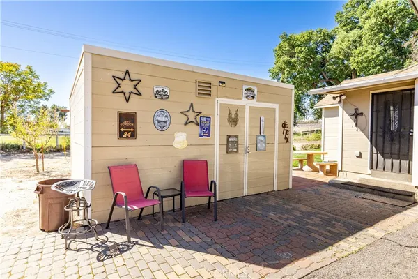 a view of a dinning room with table and chairs