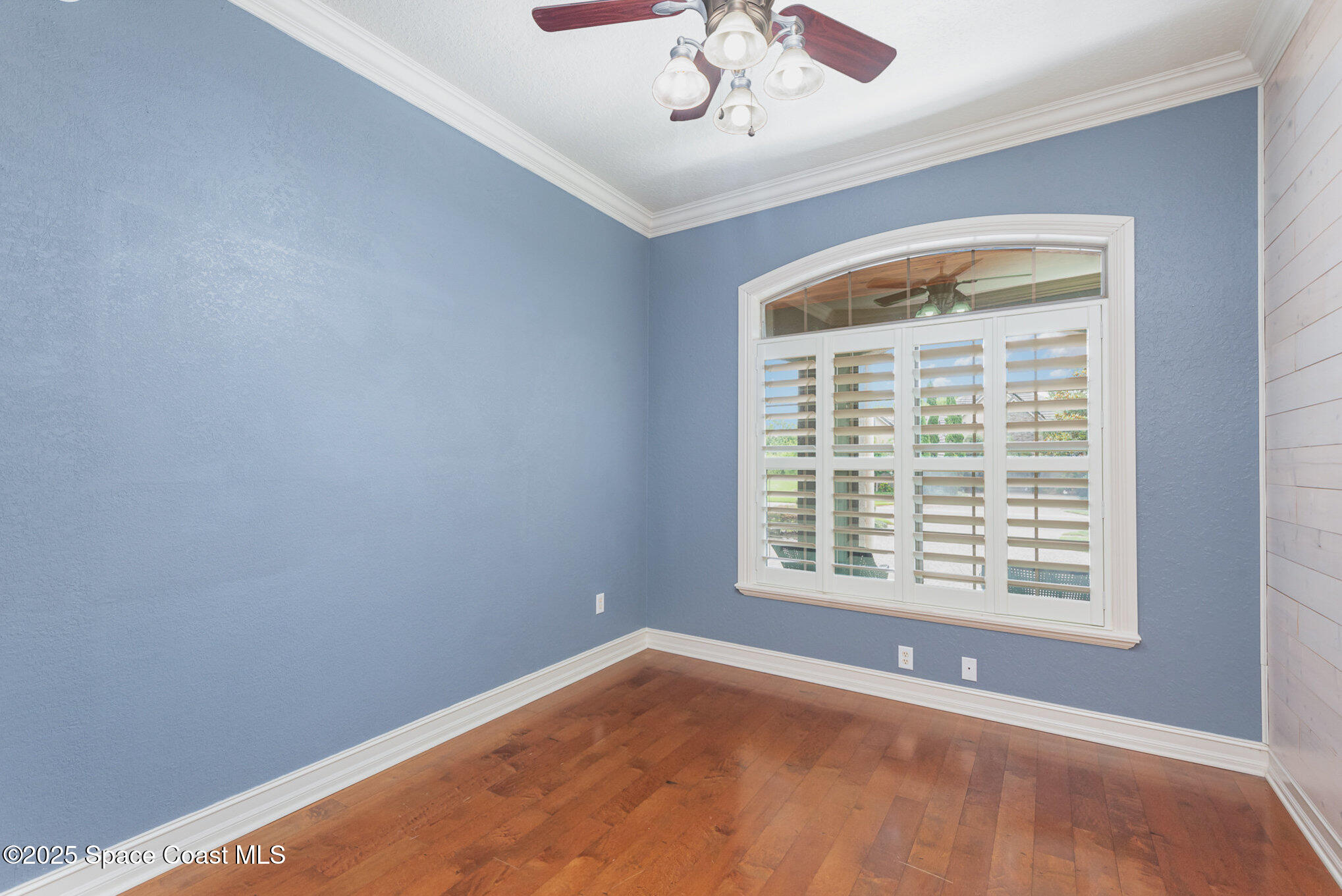 3260 Quantum Place Mims, FL 32754 - Photo 22 of 43 a view of an empty room with a window