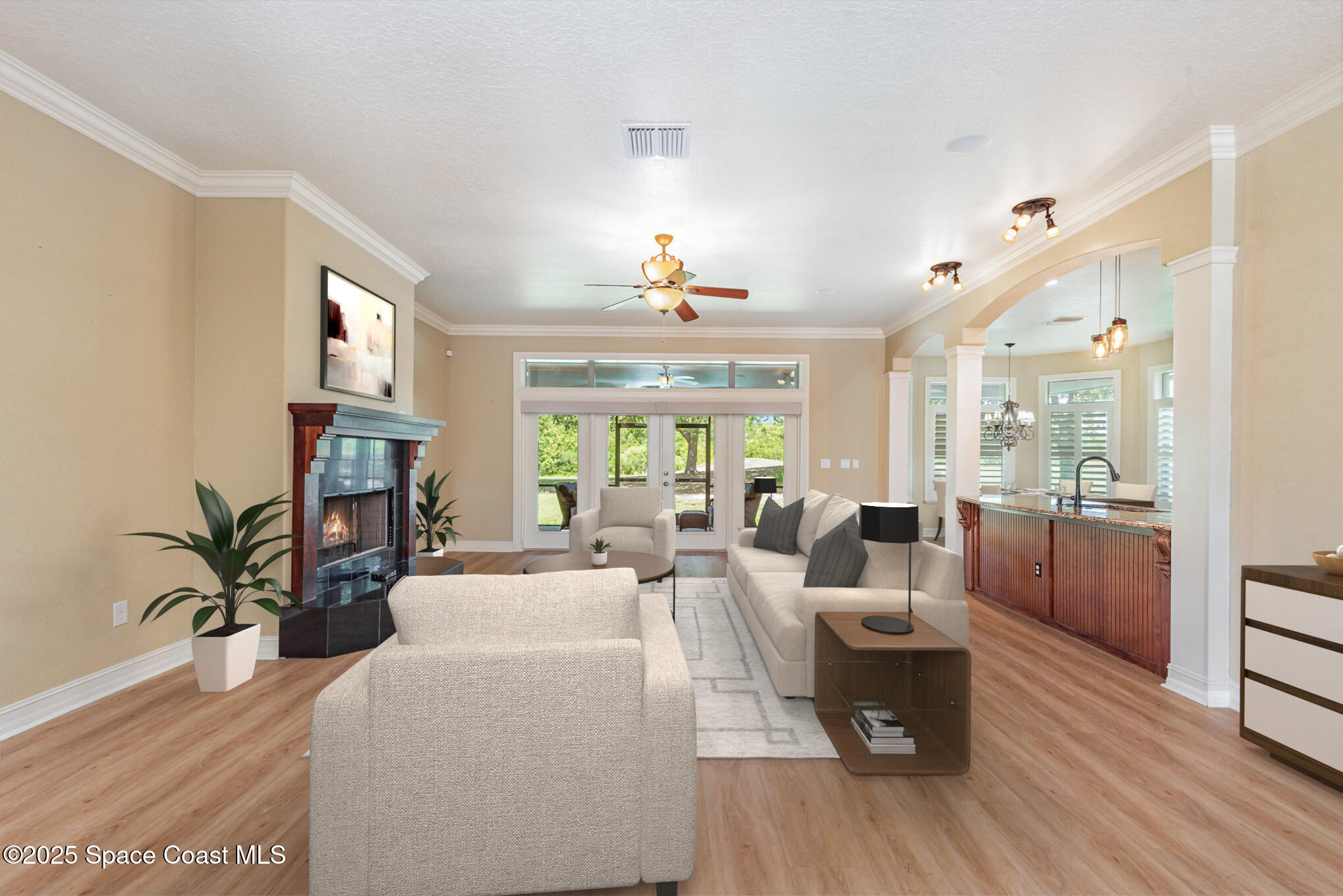 3260 Quantum Place Mims, FL 32754 - Photo 3 of 43 a living room with fireplace furniture and a wooden floor