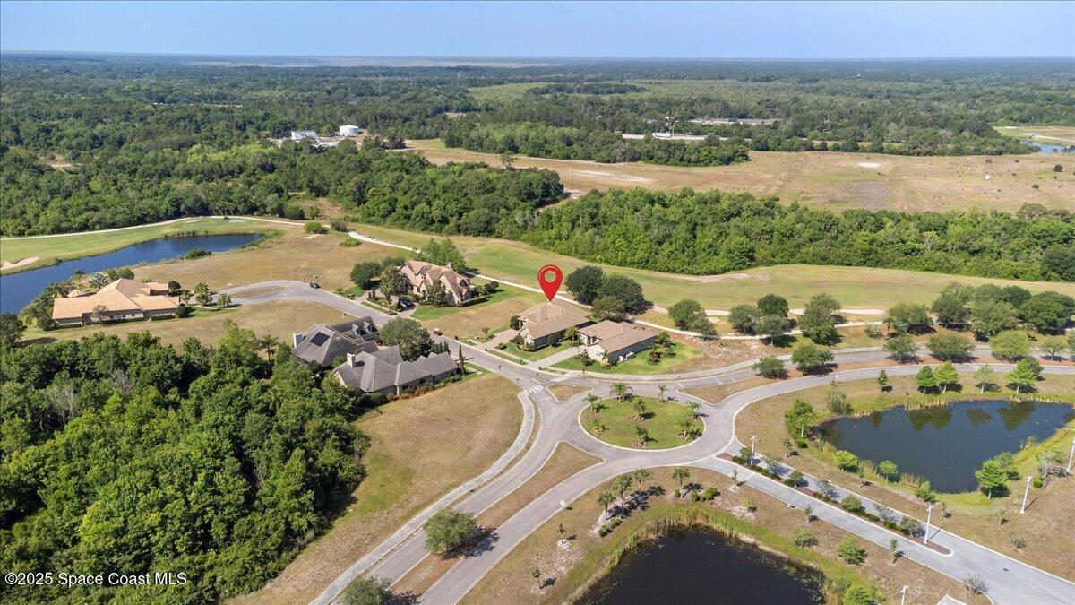 3260 Quantum Place Mims, FL 32754 - Photo 39 of 43 an aerial view of a house with outdoor space