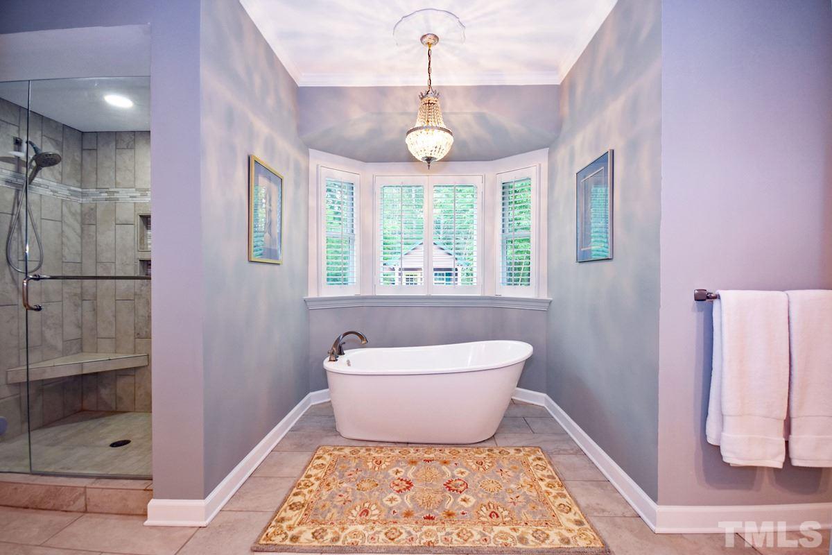 3230 Preacher Holmes Road Graham, NC 27253 - Photo 11 of 24 LUXURY master bed with farm tub and tiled shower
