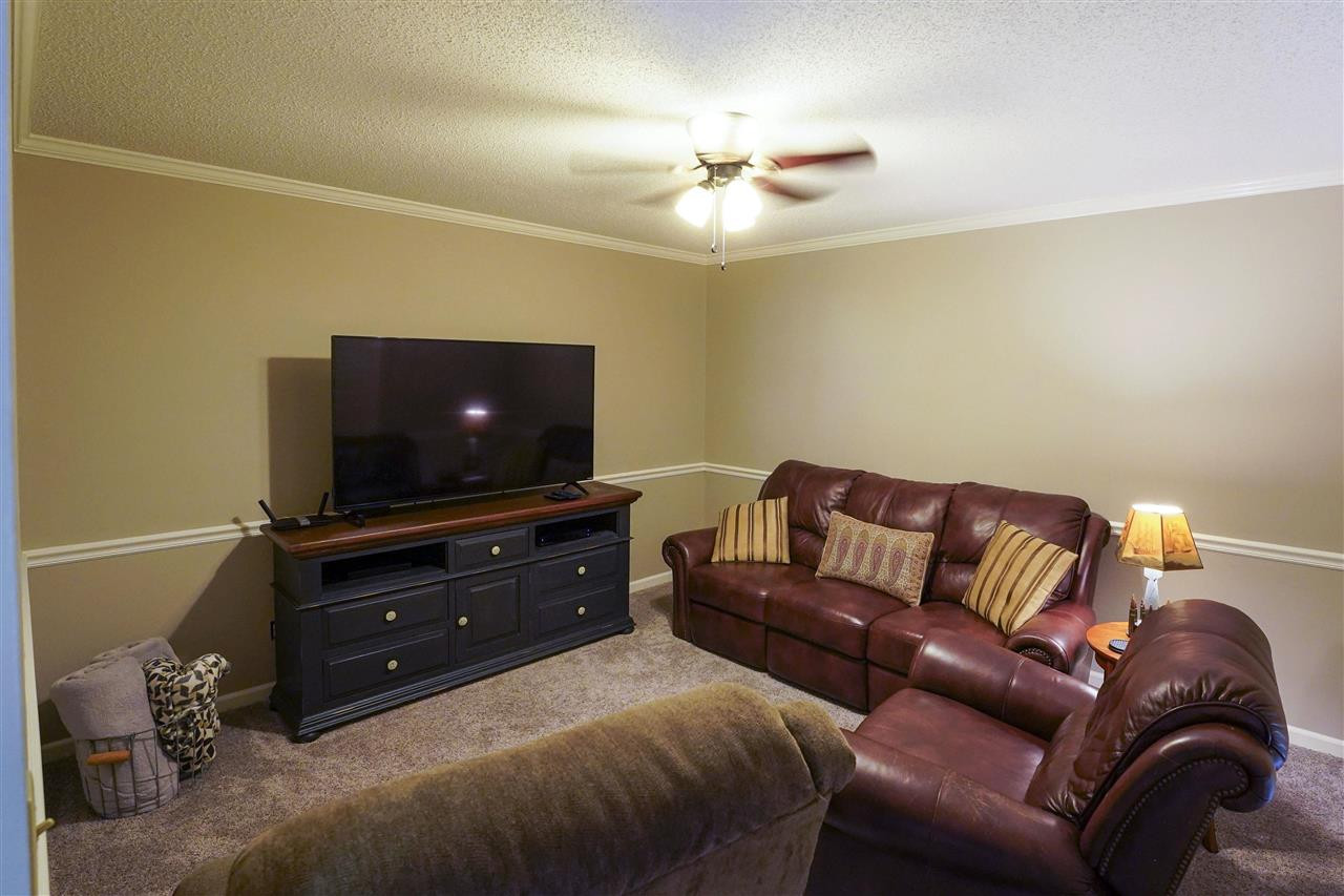1327 Hyndsver Road Martin, TN 38237 - Photo 6 of 17 a living room with furniture and a flat screen tv