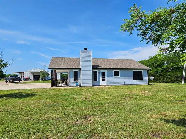 a view of a terrace with a lake view
