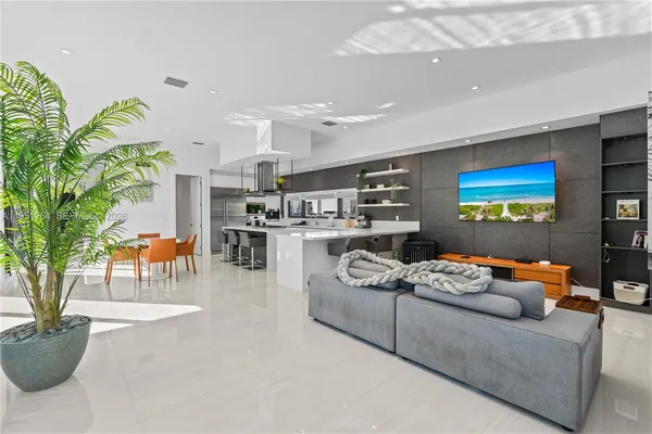 a bedroom with a bed and ceiling fan