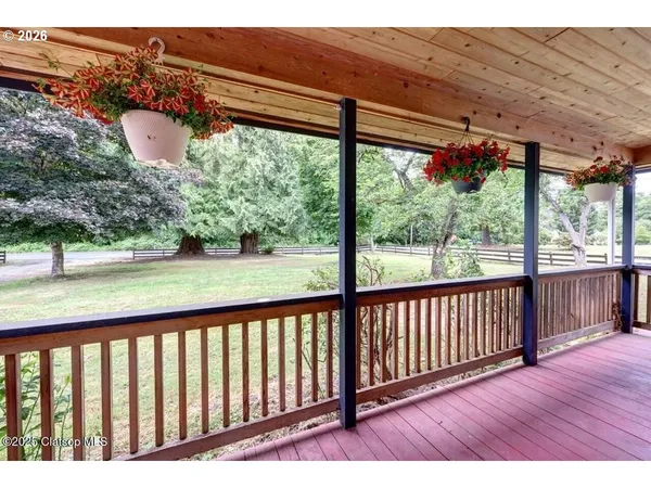 a view of livingroom with furniture wooden floor and window