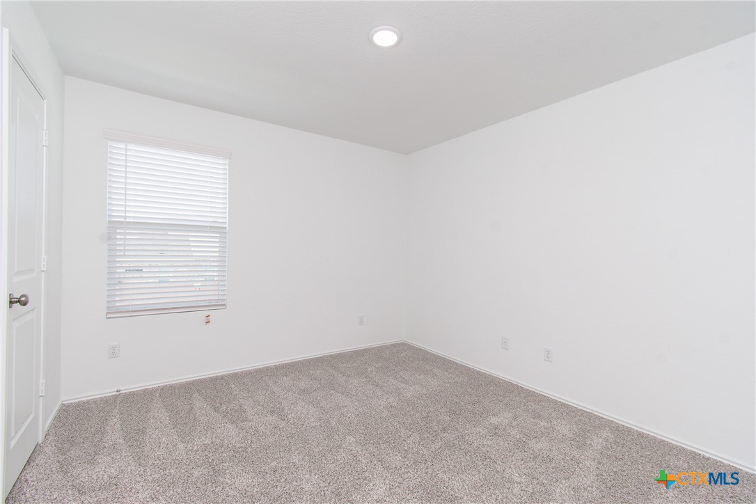 9101 Daisy Cutter Crossing Georgetown, TX 78626 - Photo 16 of 28 an empty room with a window