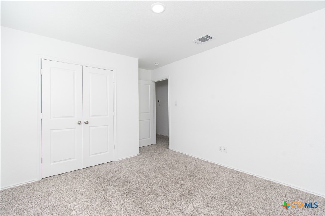 9101 Daisy Cutter Crossing Georgetown, TX 78626 - Photo 21 of 28 a view of an empty room