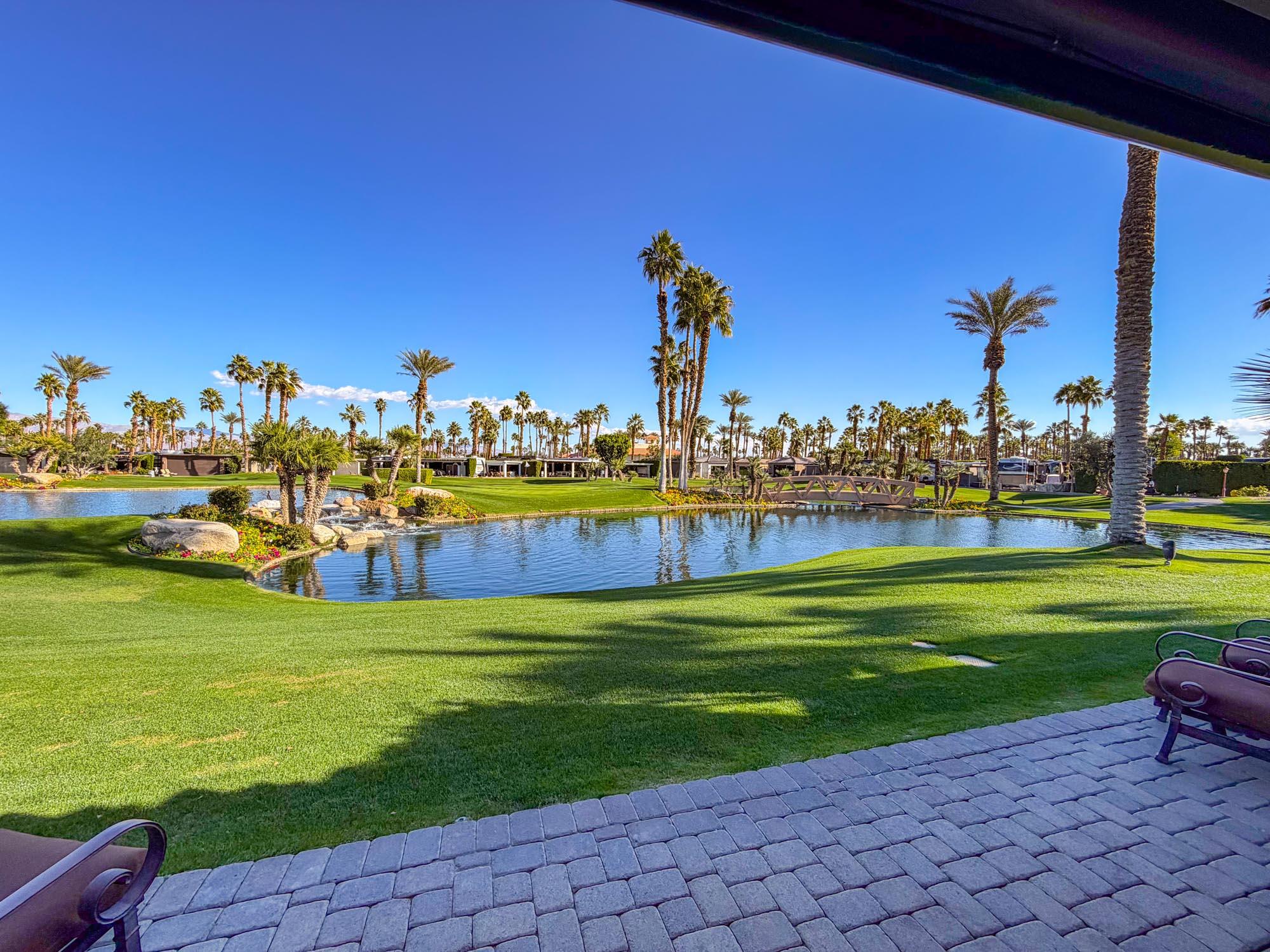 80394 Ave 48, Unit 321 Indio, CA 92201 - Photo 13 of 20 a view of a lake with a big yard