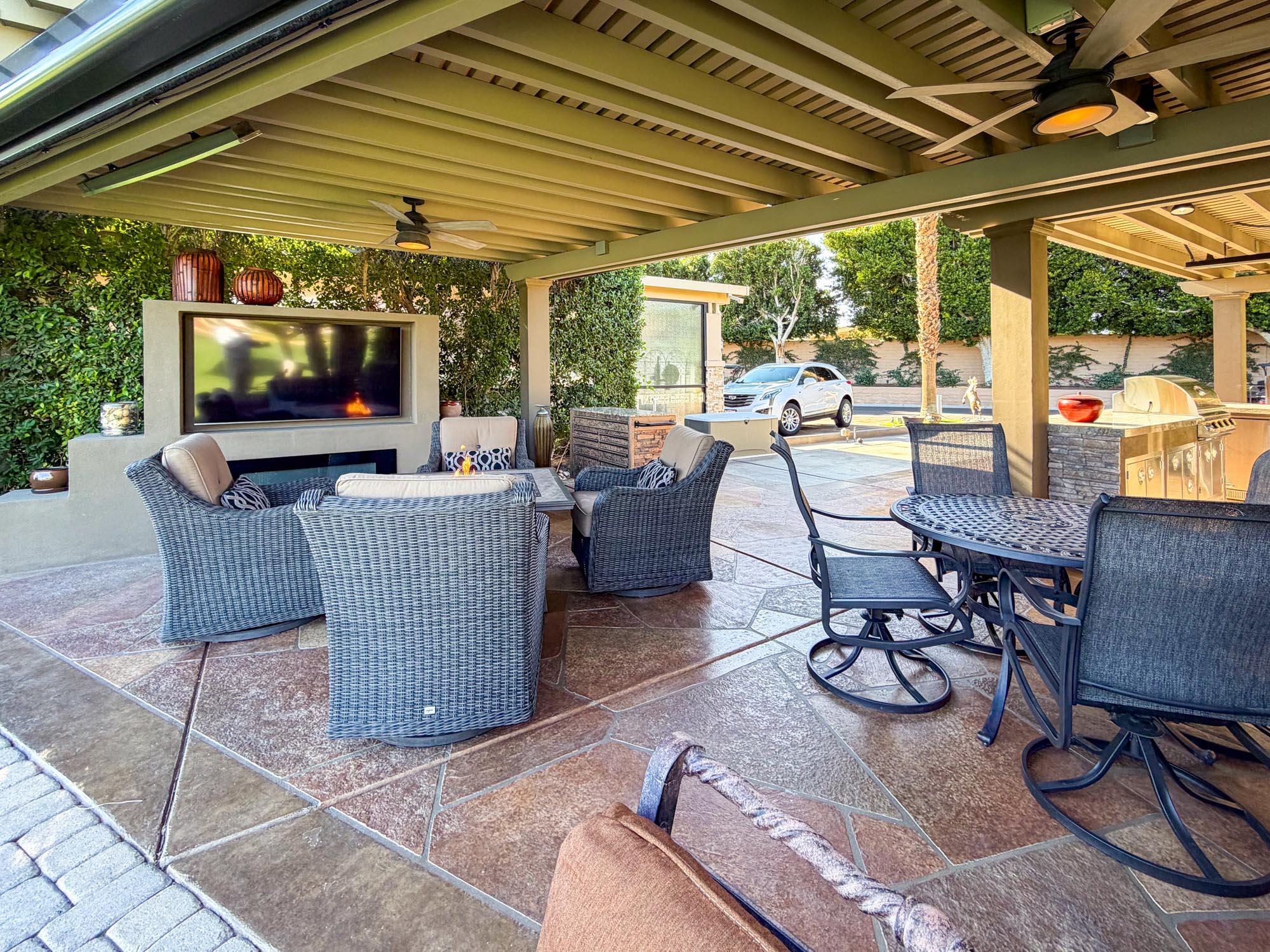 80394 Ave 48, Unit 321 Indio, CA 92201 - Photo 18 of 20 a building outdoor space with patio furniture and potted plants