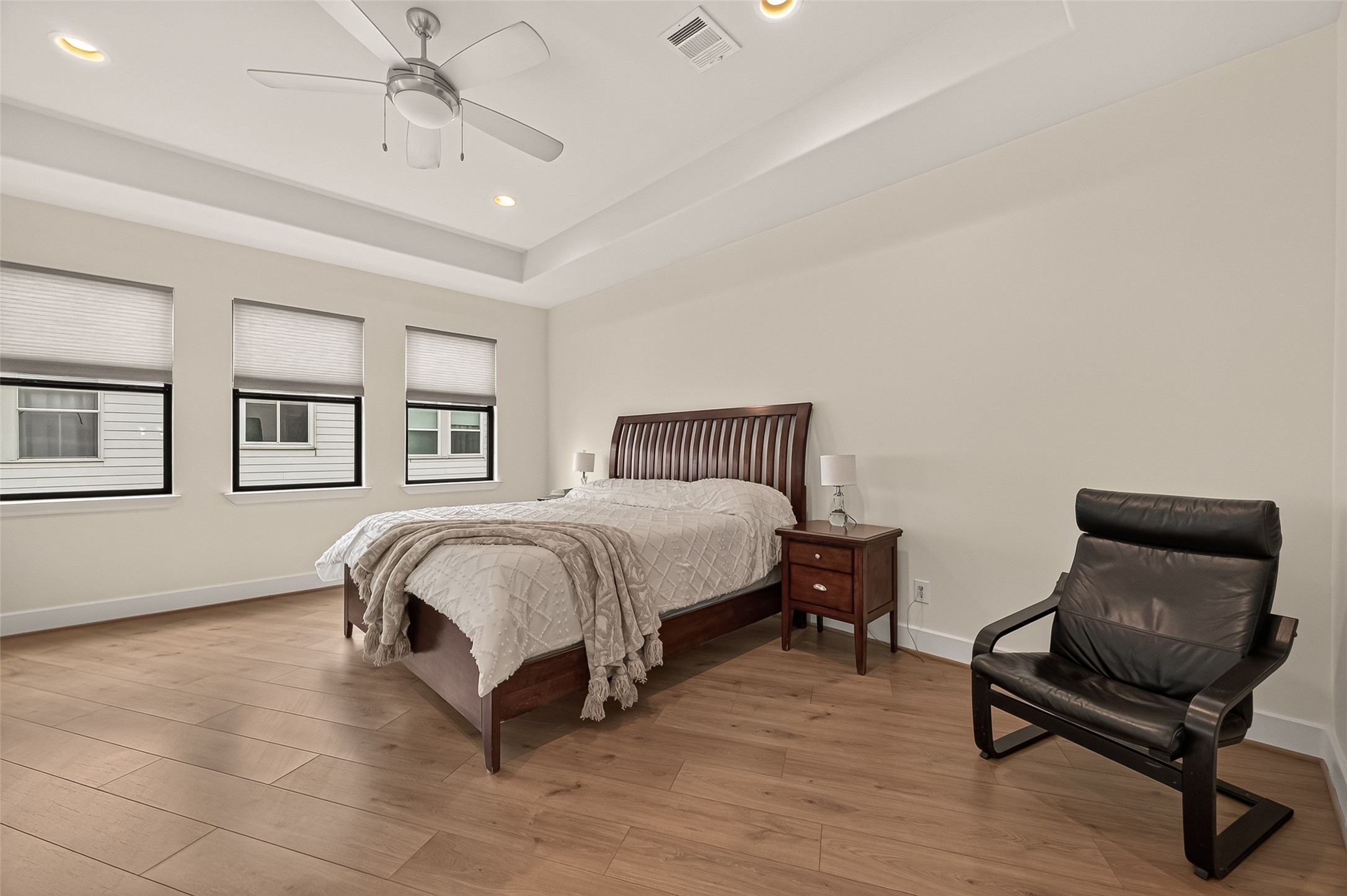 1767 Michigan Street Houston, TX 77006 - Photo 21 of 33 The primary bedroom features a spacious layout with light wood flooring