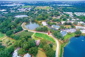 0 Lake Buckeye Road Winter Haven, FL 33881 - Photo 1 of 1 an aerial view of residential houses with outdoor space and trees