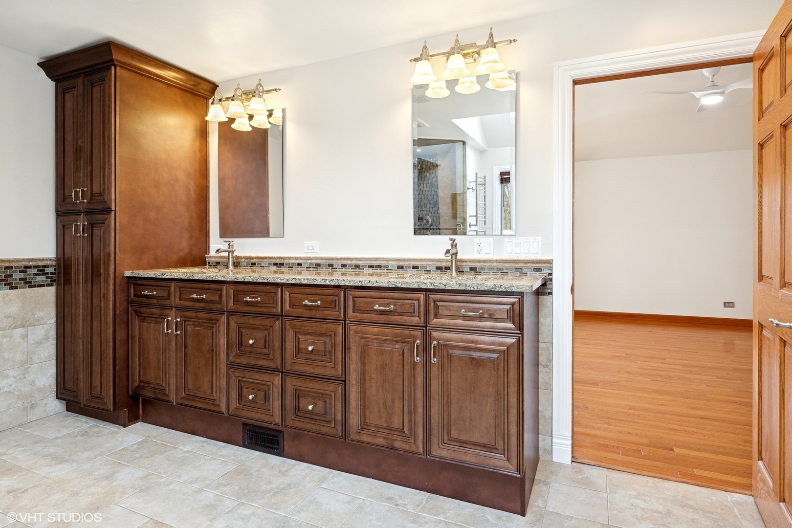 3170 Keystone Road Northbrook, IL 60062 - Photo 23 of 42 a bathroom with a granite countertop sink and a mirror