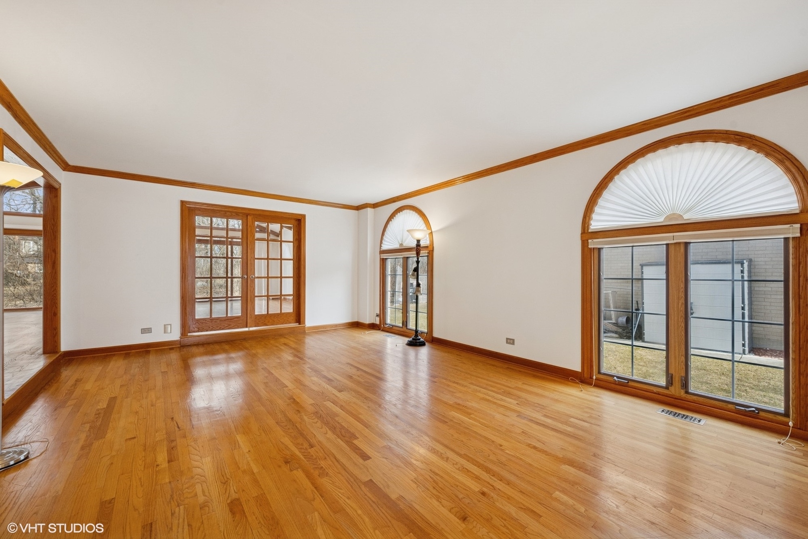 3170 Keystone Road Northbrook, IL 60062 - Photo 4 of 42 a view of an empty room with glass door and wooden floor