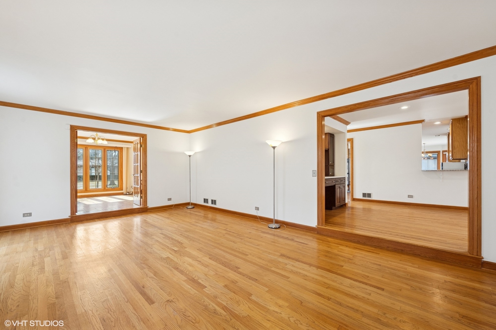 3170 Keystone Road Northbrook, IL 60062 - Photo 5 of 42 a view of an empty room with wooden floor and a window
