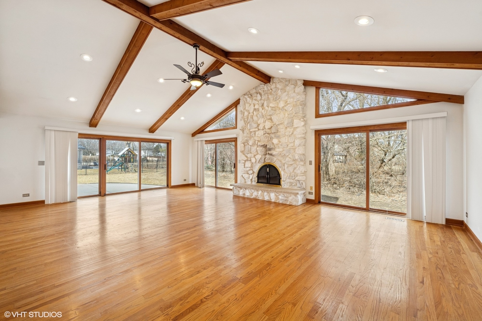 3170 Keystone Road Northbrook, IL 60062 - Photo 8 of 42 a view of an empty room with wooden floor and a window