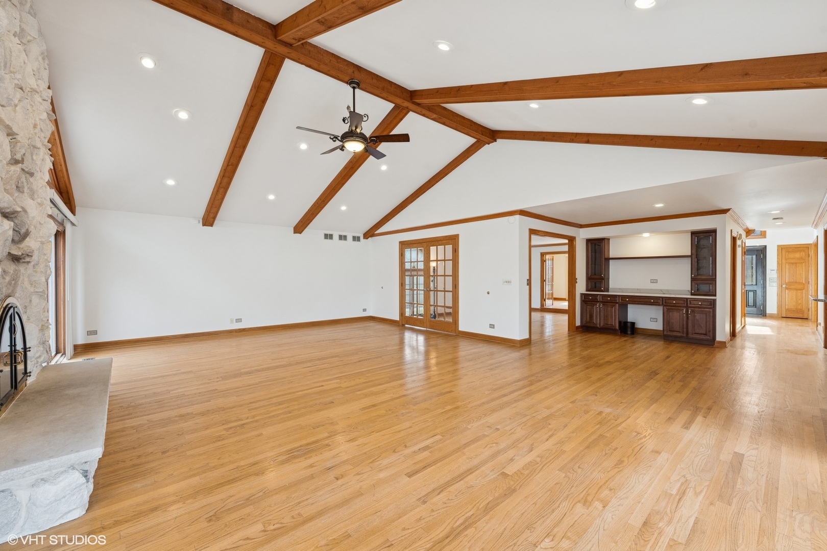 3170 Keystone Road Northbrook, IL 60062 - Photo 9 of 42 a view of an empty room with wooden floor and a ceiling fan