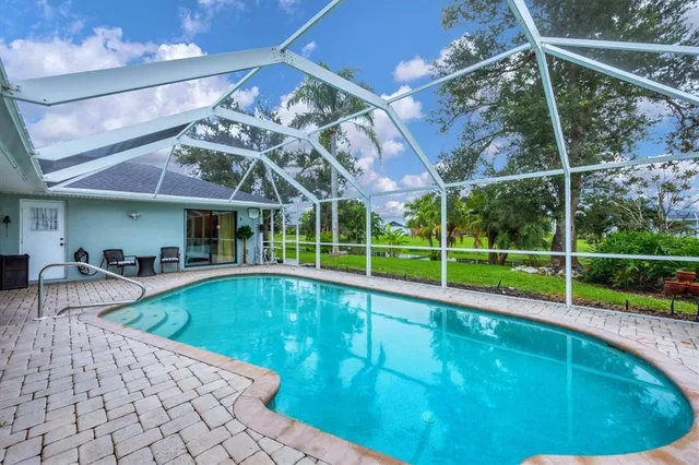 a view of indoor pool and sitting area