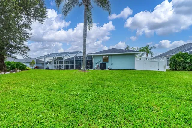 an aerial view of a house with a garden