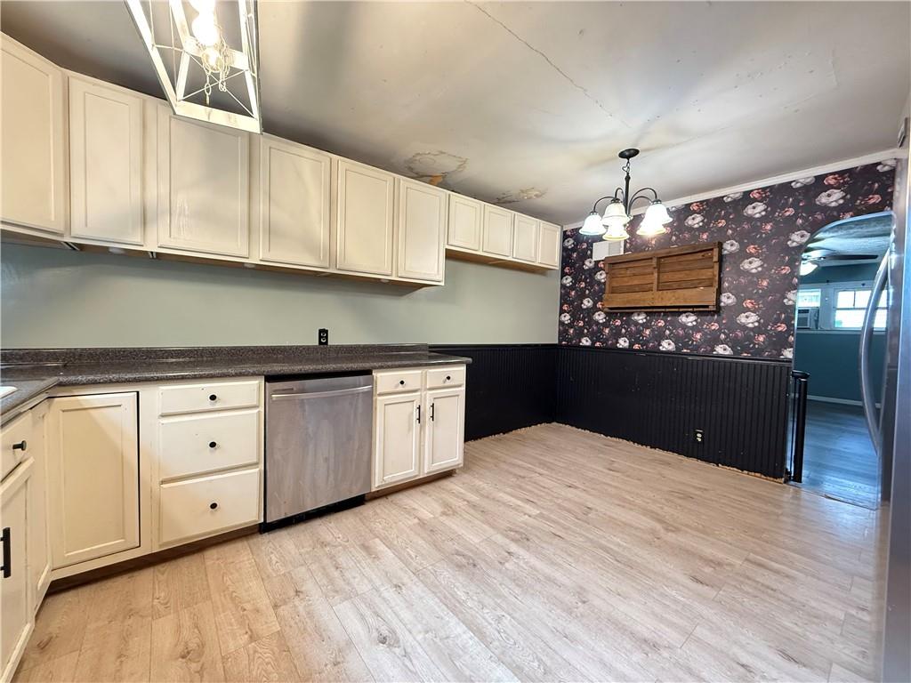 63 Fredonia Road Greenville, PA 16125 - Photo 15 of 32 a kitchen with cabinets a sink and dishwasher