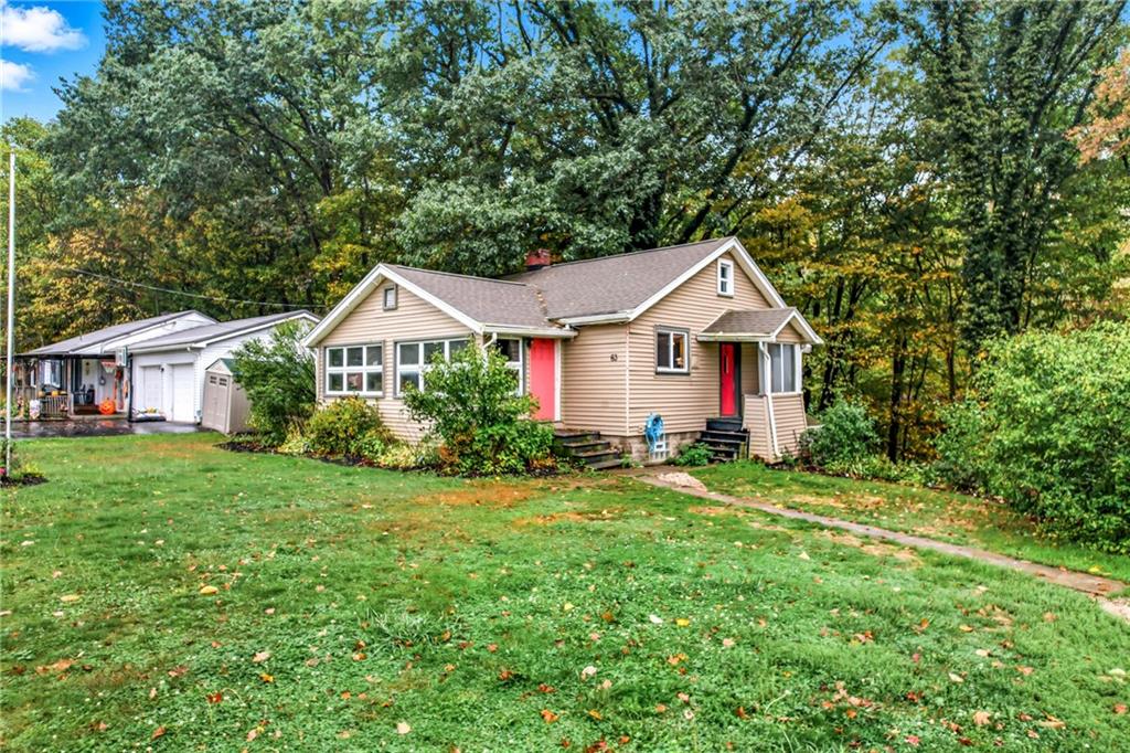 63 Fredonia Road Greenville, PA 16125 - Photo 2 of 32 a front view of a house with a yard and trees