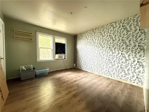 a bathroom with a toilet and a bathtub