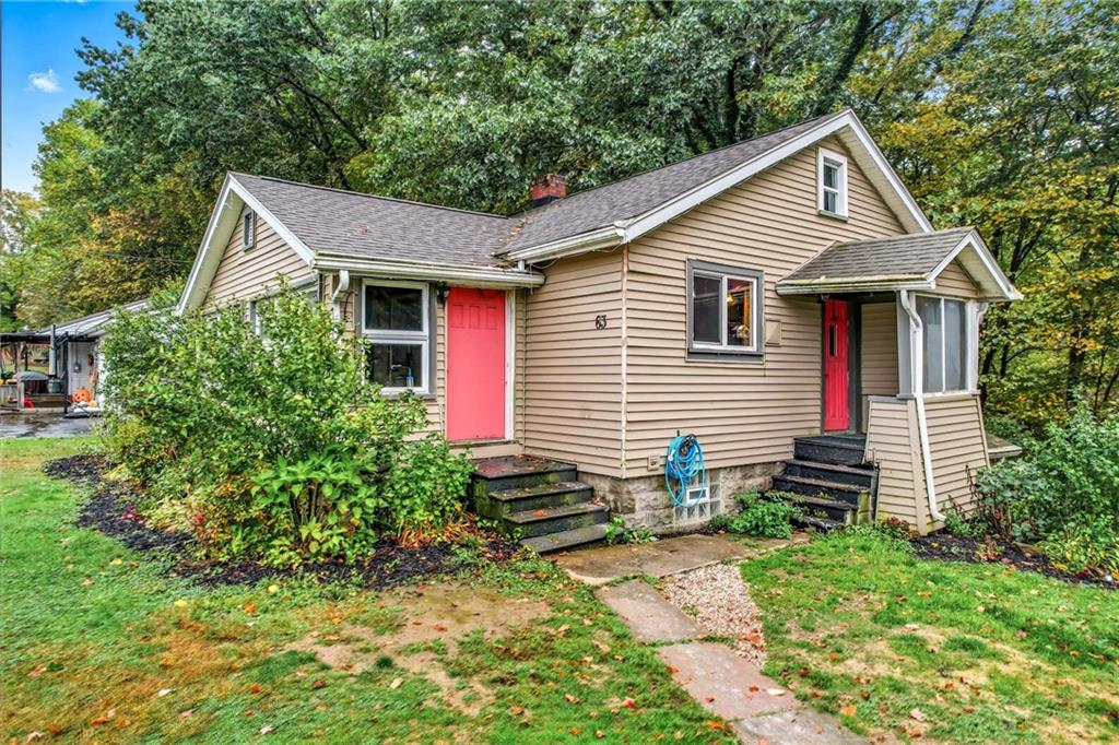 63 Fredonia Road Greenville, PA 16125 - Photo 3 of 32 a front view of house with yard and trees around
