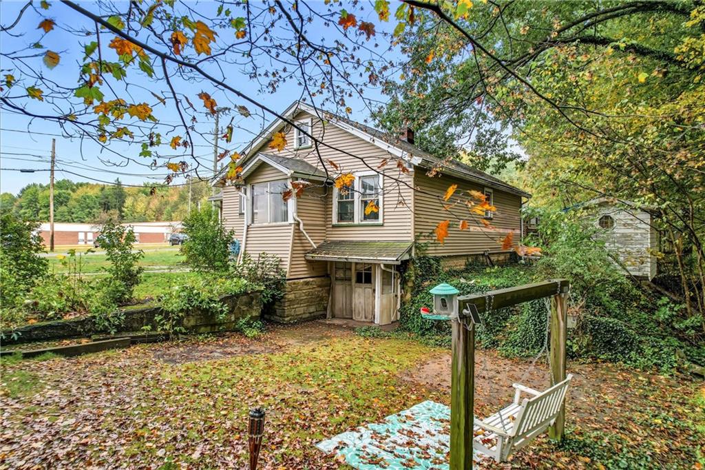 63 Fredonia Road Greenville, PA 16125 - Photo 5 of 32 a front view of a house with garden