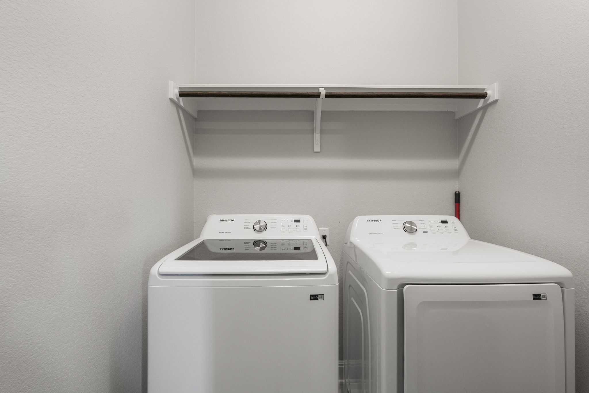 772 Founders Ridge Dripping Springs, TX 78620 - Photo 30 of 40 The dedicated laundry room provides additional storage and functionality within the single-story layout.