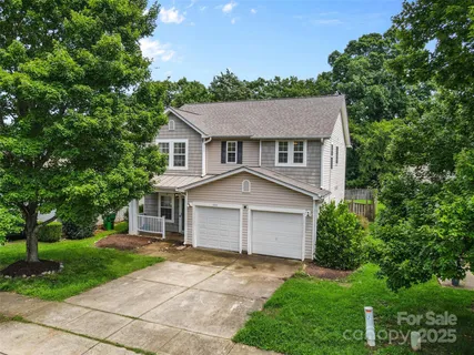 front view of a house and a yard