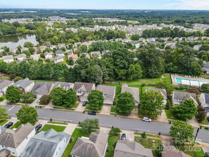 an aerial view of a house with a garden
