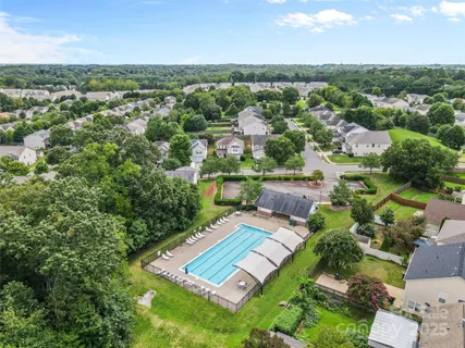 an aerial view of a house with a garden