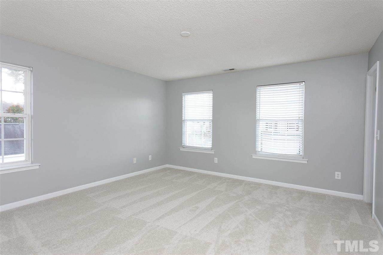 8108 Inverbrass Court Raleigh, NC 27616 - Photo 13 of 25 a view of an empty room with a window
