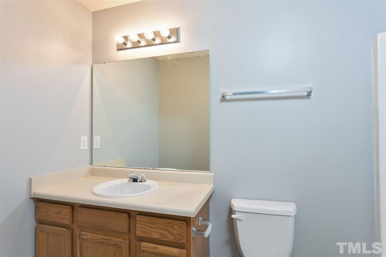 8108 Inverbrass Court Raleigh, NC 27616 - Photo 15 of 25 a bathroom with a sink and a toilet