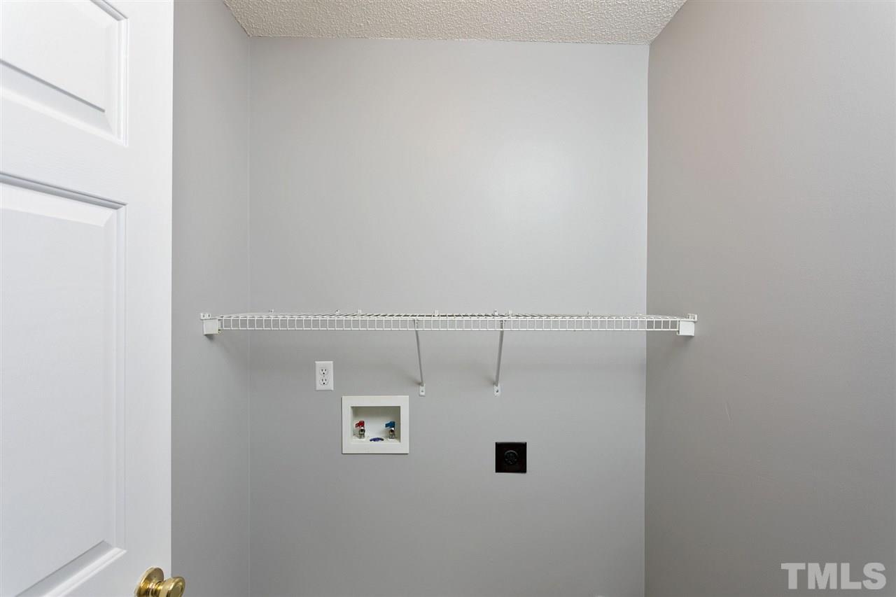 8108 Inverbrass Court Raleigh, NC 27616 - Photo 18 of 25 a close view of a refrigerator in kitchen