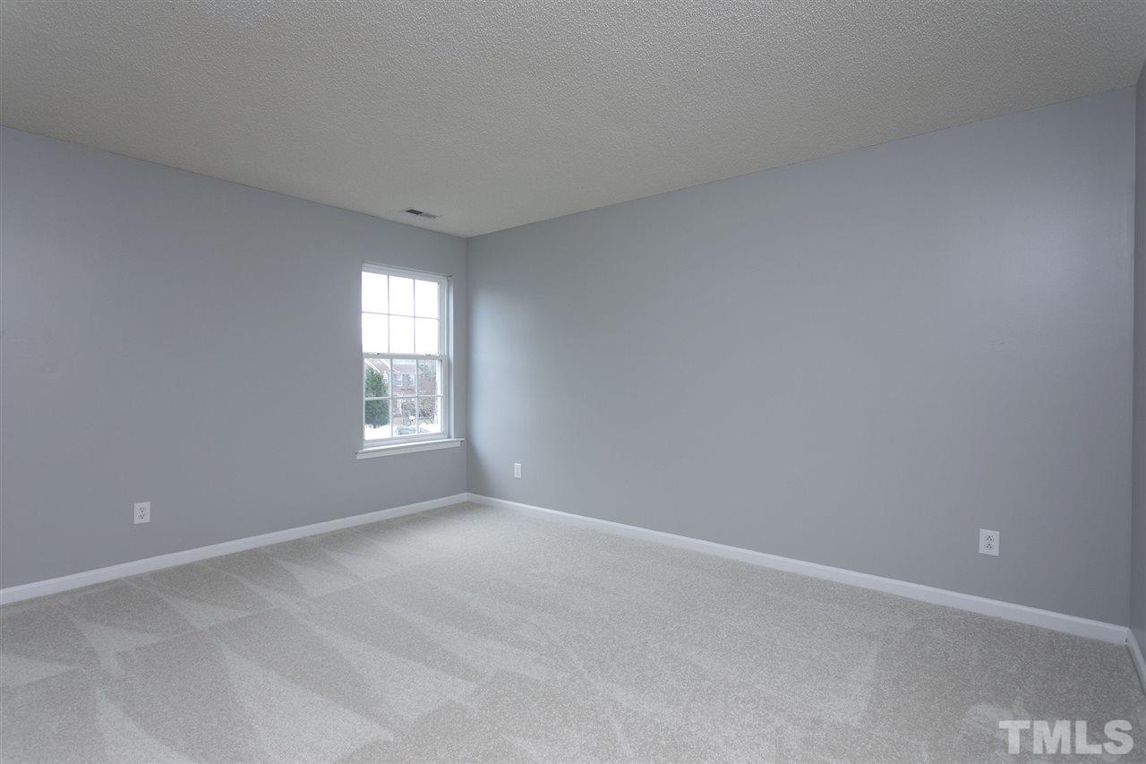 8108 Inverbrass Court Raleigh, NC 27616 - Photo 19 of 25 a view of empty room with window
