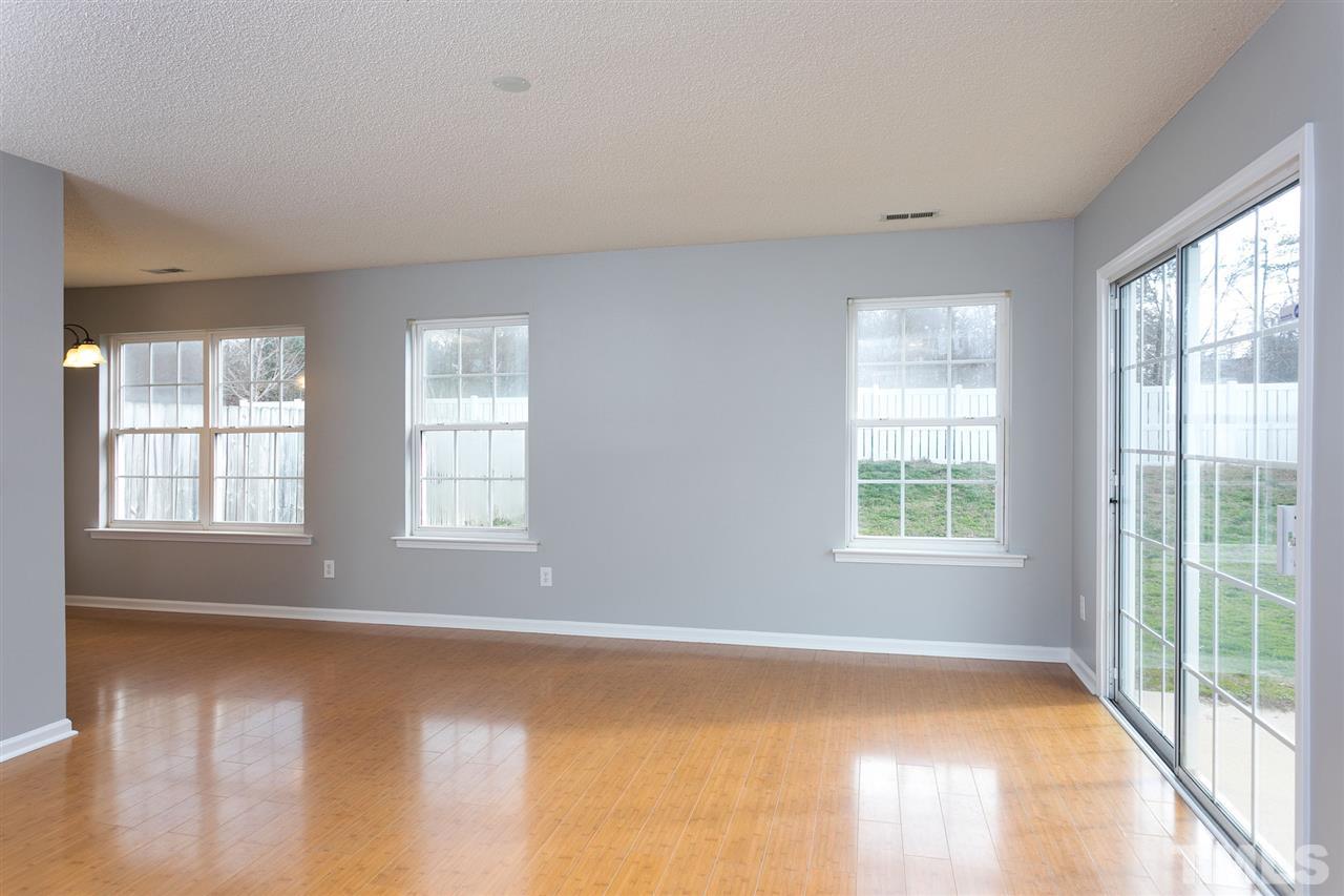 8108 Inverbrass Court Raleigh, NC 27616 - Photo 3 of 25 a view of an empty room with a window