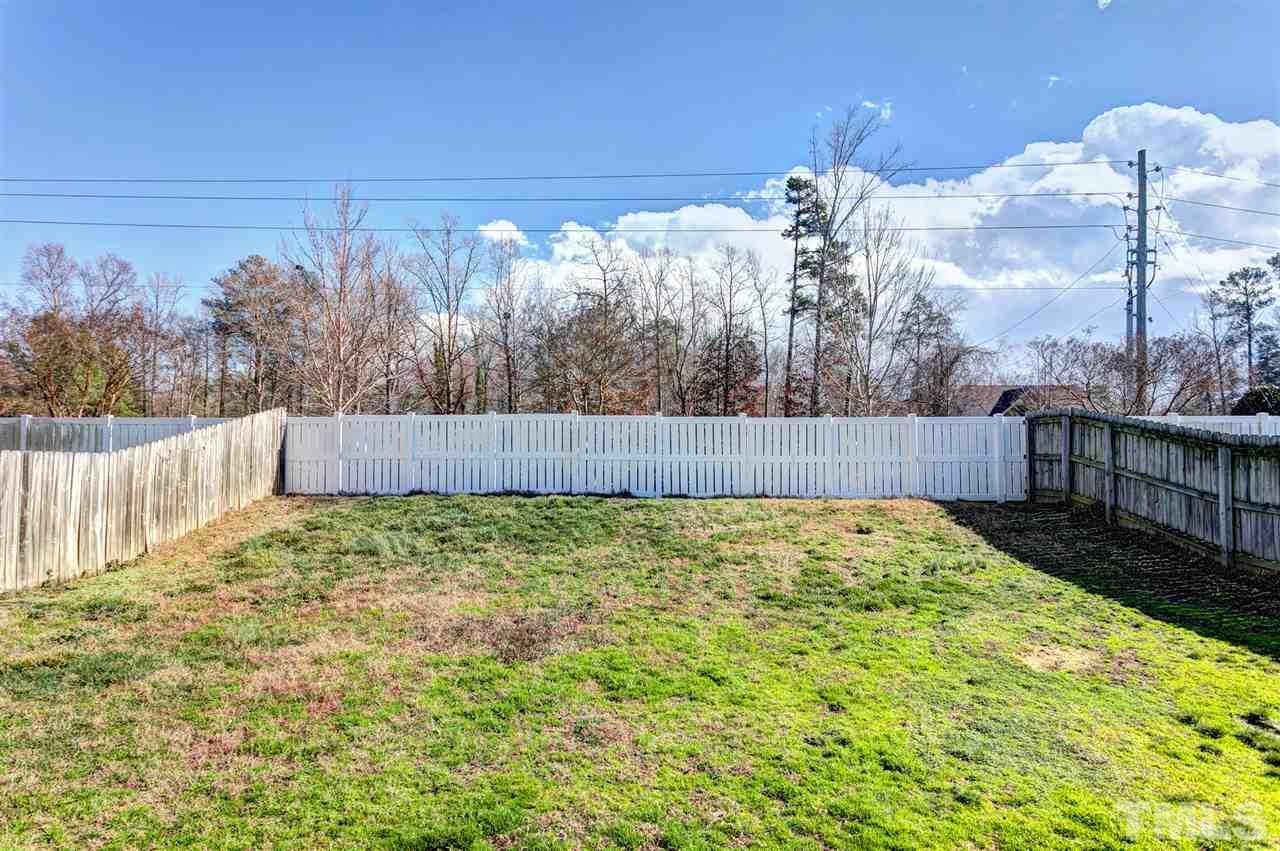 8108 Inverbrass Court Raleigh, NC 27616 - Photo 23 of 25 a view of backyard with tree