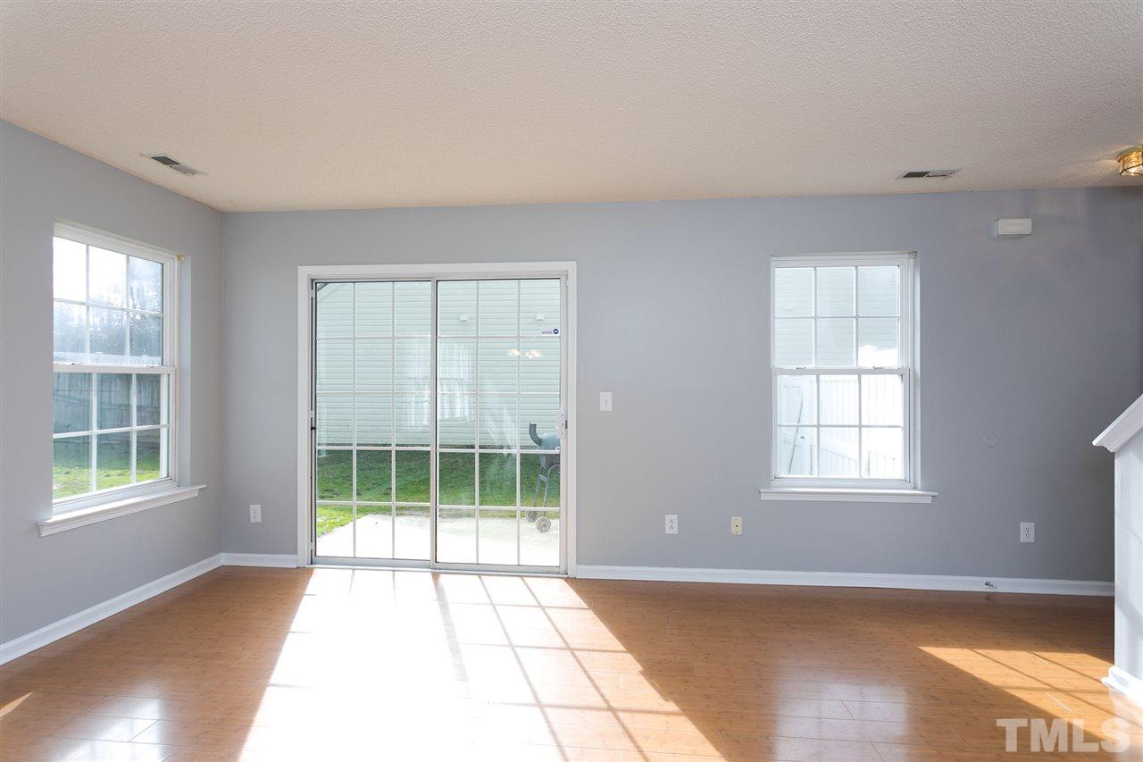 8108 Inverbrass Court Raleigh, NC 27616 - Photo 4 of 25 an empty room with windows and closet