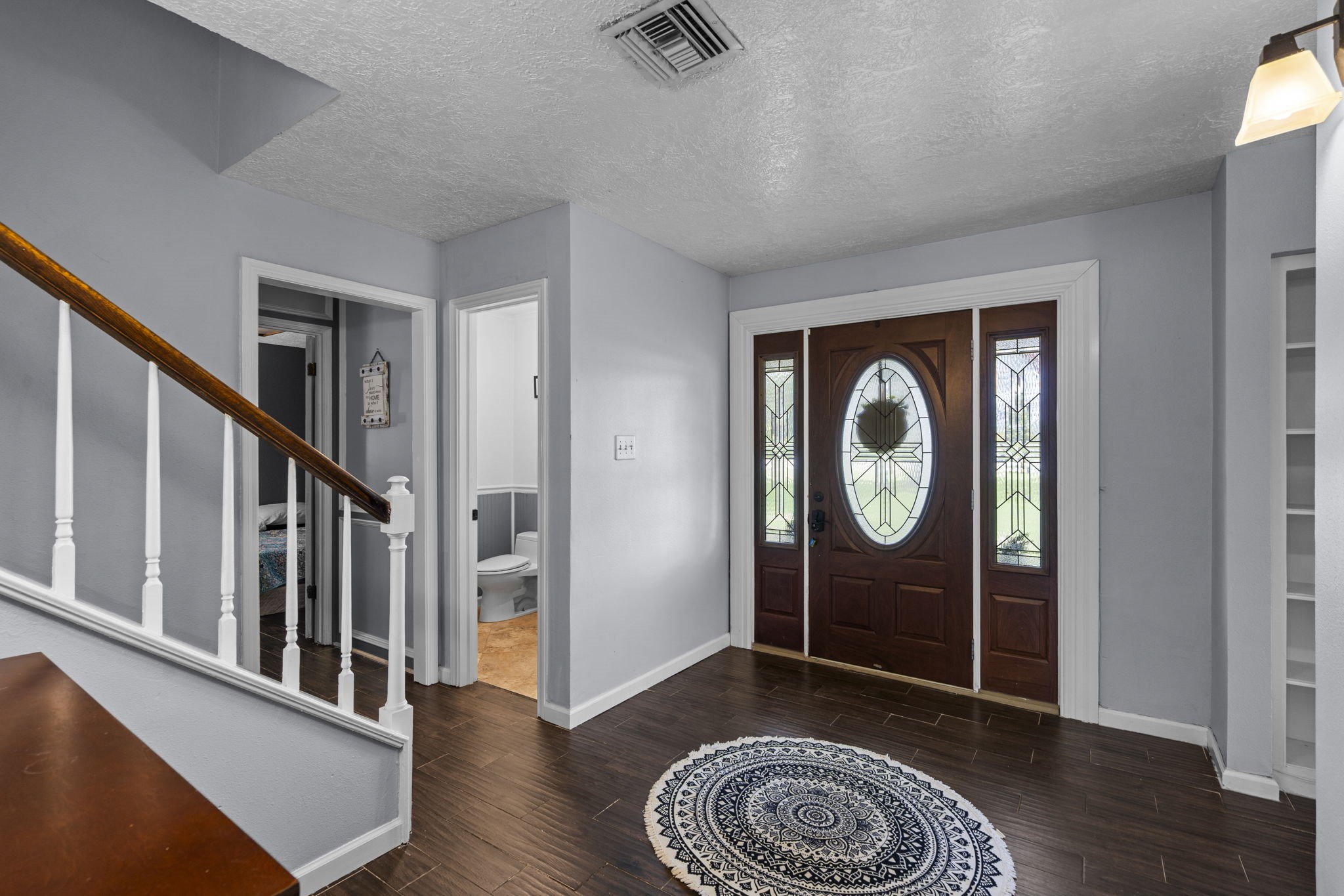 7009 Avenue R Santa Fe, TX 77510 - Photo 7 of 48 Check out those leaded glass doors.
