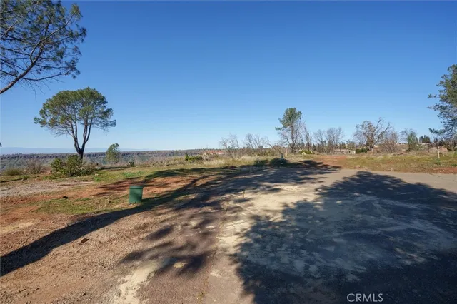 a view of a lake with a yard