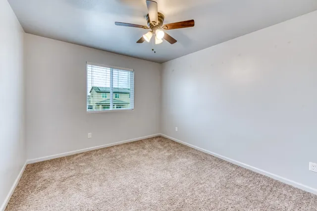 en empty room with windows