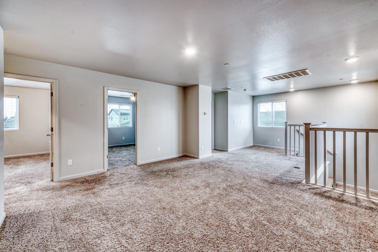 1391 Shoreside Drive Madera, CA 93637 - Photo 8 of 30 en empty room with windows