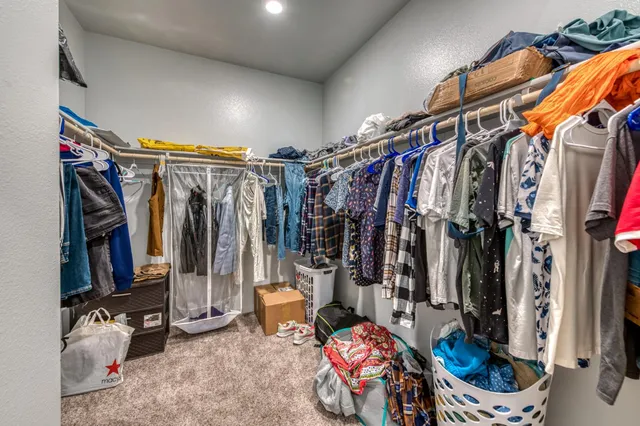 a bathroom with a sink a mirror and shower